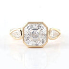 Top-down view of a full bezel 3 CT Asscher cut lab grown diamond ring flanked by two bezel pear side stones.
