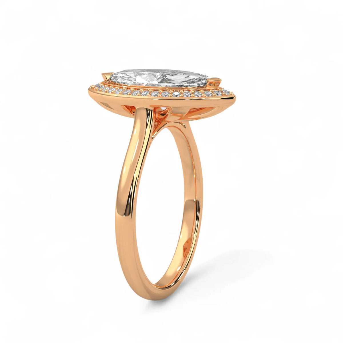 Angled side view of a 4 CT marquise cut lab grown diamond halo engagement ring in romantic rose gold.
