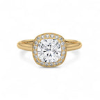 Top-down view of a 3 carat cushion cut lab diamond halo engagement ring in polished yellow gold.