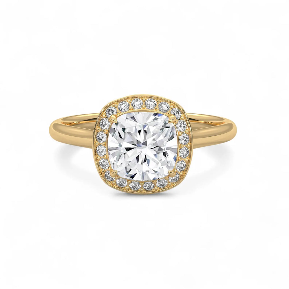 Top-down view of a 3 carat cushion cut lab diamond halo engagement ring in polished yellow gold.
