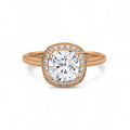 Top-down view of a 3 CT cushion cut lab grown diamond micro-pavé halo ring in rose gold.