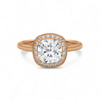 Top-down view of a 3 CT cushion cut lab grown diamond micro-pavé halo ring in rose gold.