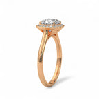 Angled side view of a 3 carat cushion cut lab diamond engagement ring with halo in rose gold.