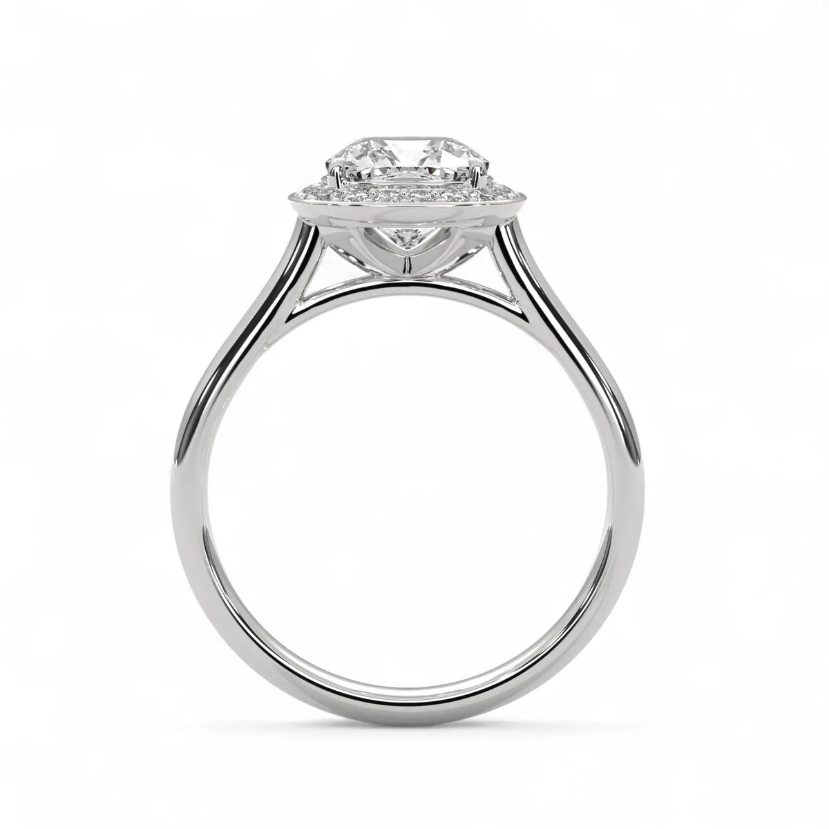 Side profile view of white gold 3 CT cushion lab grown diamond engagement ring showing cathedral bridge detail.