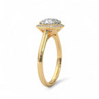 Angled side view of a 3 CT cushion cut lab grown diamond halo engagement ring in 14k yellow gold.