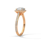 Angled side view of a rose gold 3 carat cushion cut lab diamond halo engagement ring displaying pavé band details.