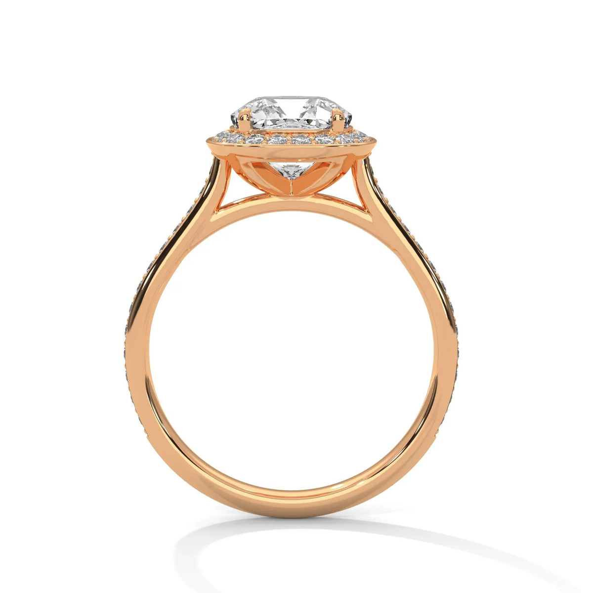 Side profile view of a rose gold 3 CT cushion lab grown diamond halo ring with cathedral setting and pavé band.