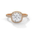 Top-down view of a 3 CT cushion cut lab grown diamond engagement ring with micro-pavé halo and pavé band in rose gold.