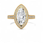 Top-down view of a 4 CT marquise cut lab grown diamond halo engagement ring with pavé band in 14k yellow gold.