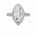 Top-down view of a 4 CT marquise cut lab grown diamond halo engagement ring in white gold with pavé band.