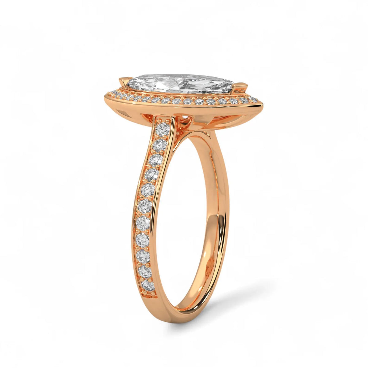 Angled side view of a 4 carat marquise cut lab diamond engagement ring with halo and pavé band in rose gold.