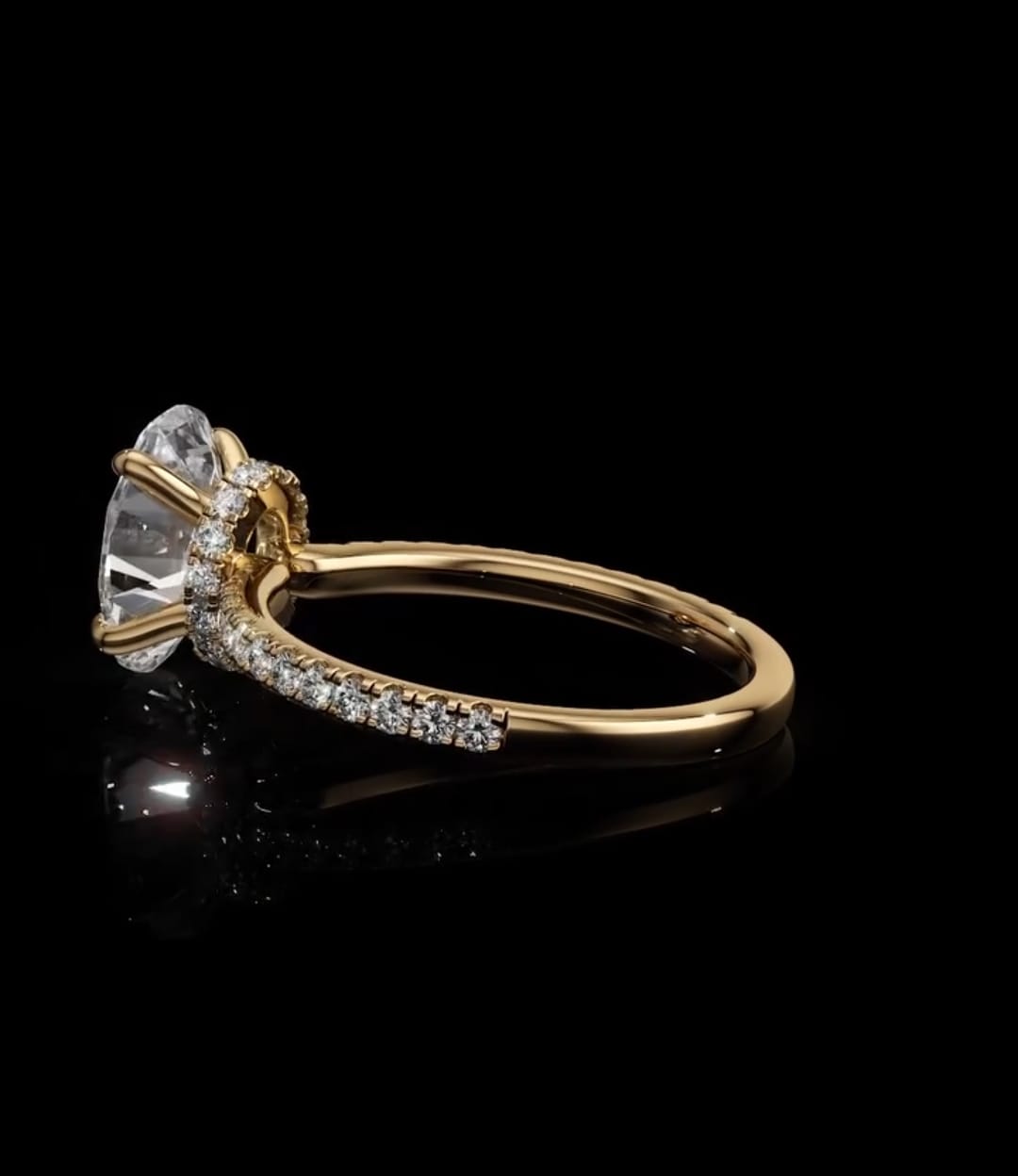 Side profile of an IGI certified 2 carat oval lab diamond ring highlighting a diamond-accented hidden halo collar beneath the center stone.