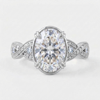 Top-down view of a white gold 4 CT oval cut lab diamond engagement ring with milgrain leaf motif band.