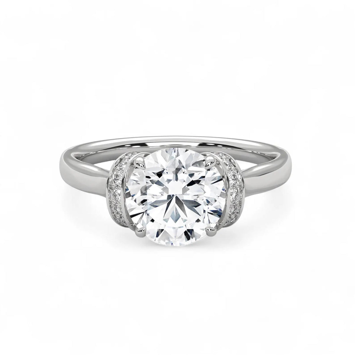 Top view of a 3 CT round cut lab grown diamond engagement ring in white gold featuring a curved pavé diamond collar.