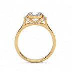 Side profile view of a 3 carat round lab grown diamond ring in yellow gold showing the intricate V-shaped pavé under-halo setting.