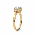 Three-quarter angle view of a yellow gold 3 carat round lab diamond engagement ring showcasing the polished band and pave setting.