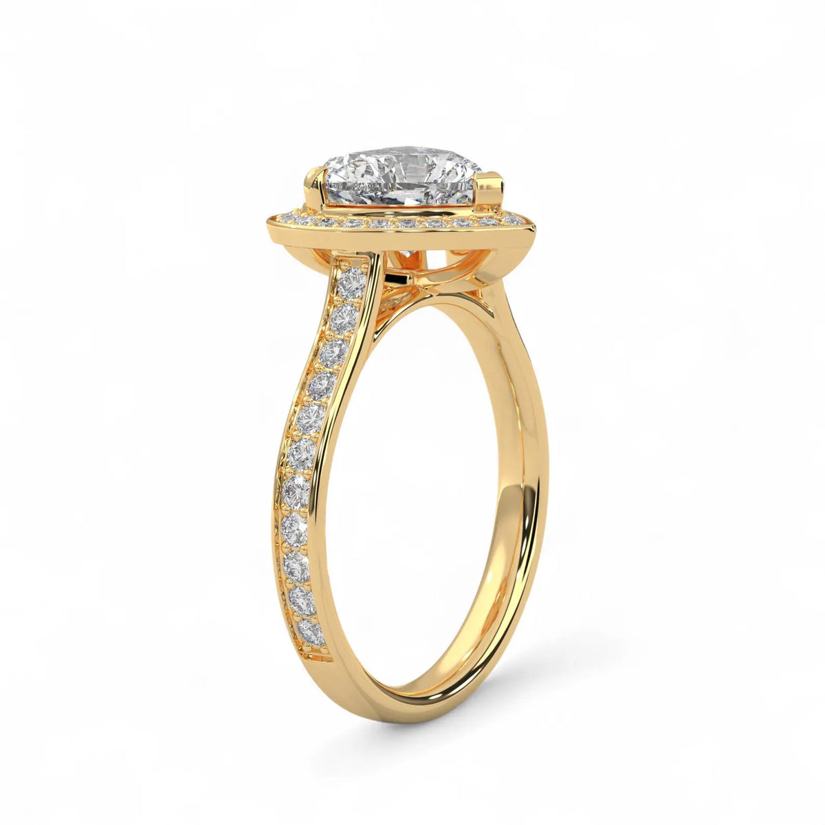 Side angle view showing the diamond halo profile and pavé band of a yellow gold 3 CT heart lab diamond ring.