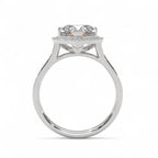 Side profile silhouette of a white gold 3 CT heart cut lab grown diamond engagement ring with elevated halo setting.