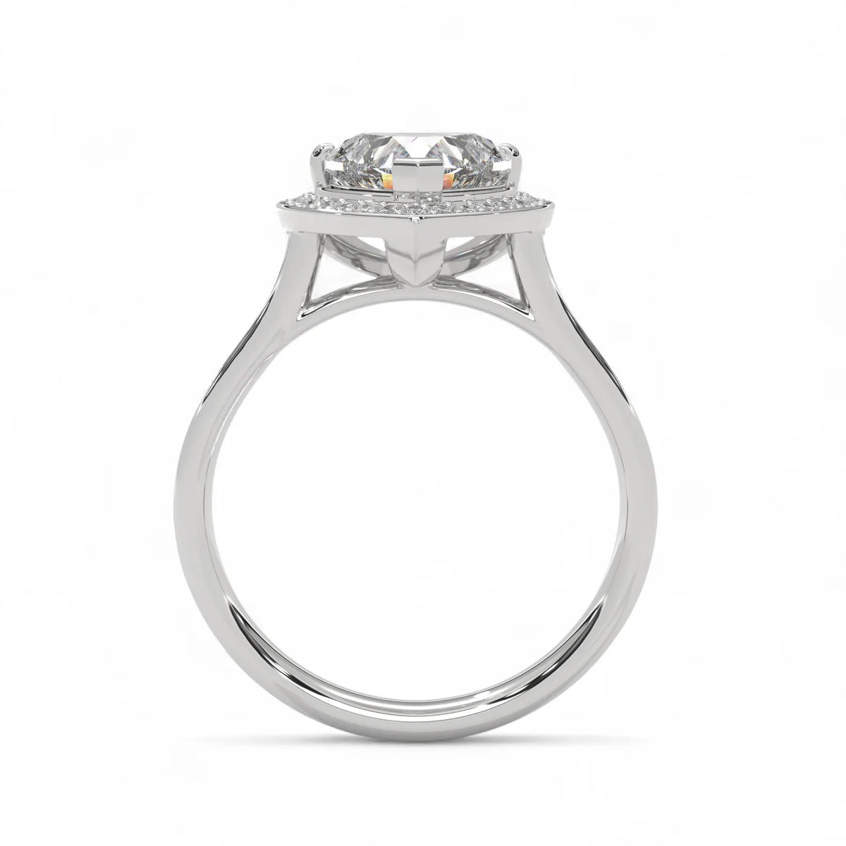 Side profile silhouette of a white gold 3 CT heart cut lab grown diamond engagement ring with elevated halo setting.