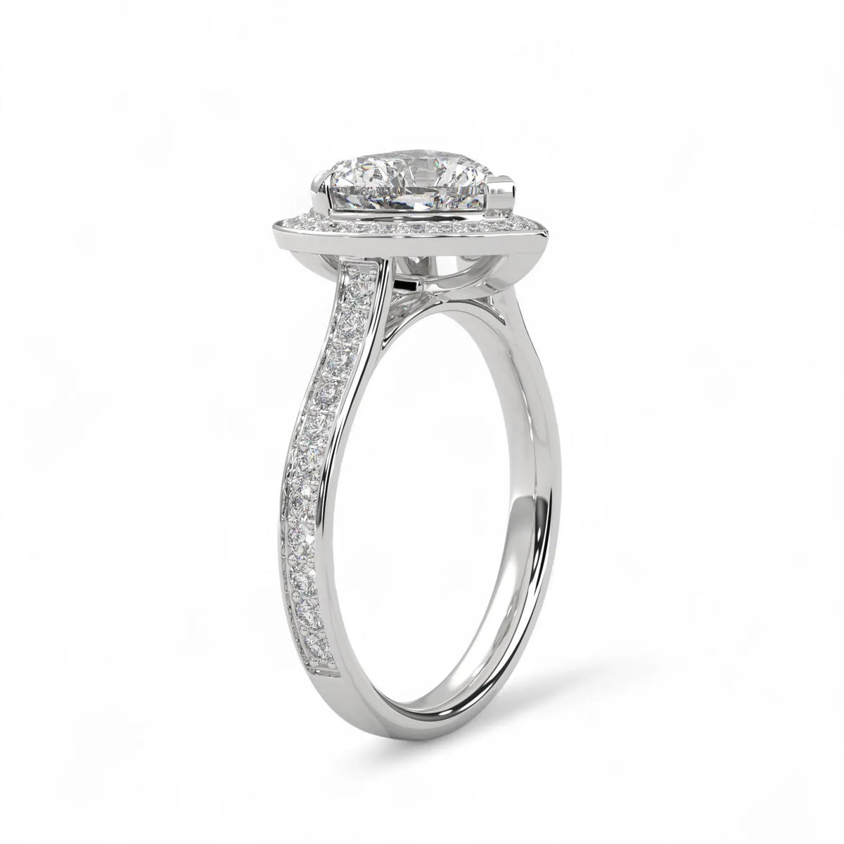 Three-quarter perspective of a 3 CT heart-shaped lab diamond halo ring in white gold highlighting the pavé shank.