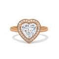 Top-down view of a 3 CT heart-cut lab grown diamond halo ring with a plain rose gold band.