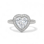 Top view of a white gold 3 carat heart cut lab-grown diamond halo engagement ring with plain shank.