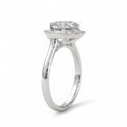 Three-quarter perspective of a 3 CT heart lab diamond halo ring on a polished white gold band.