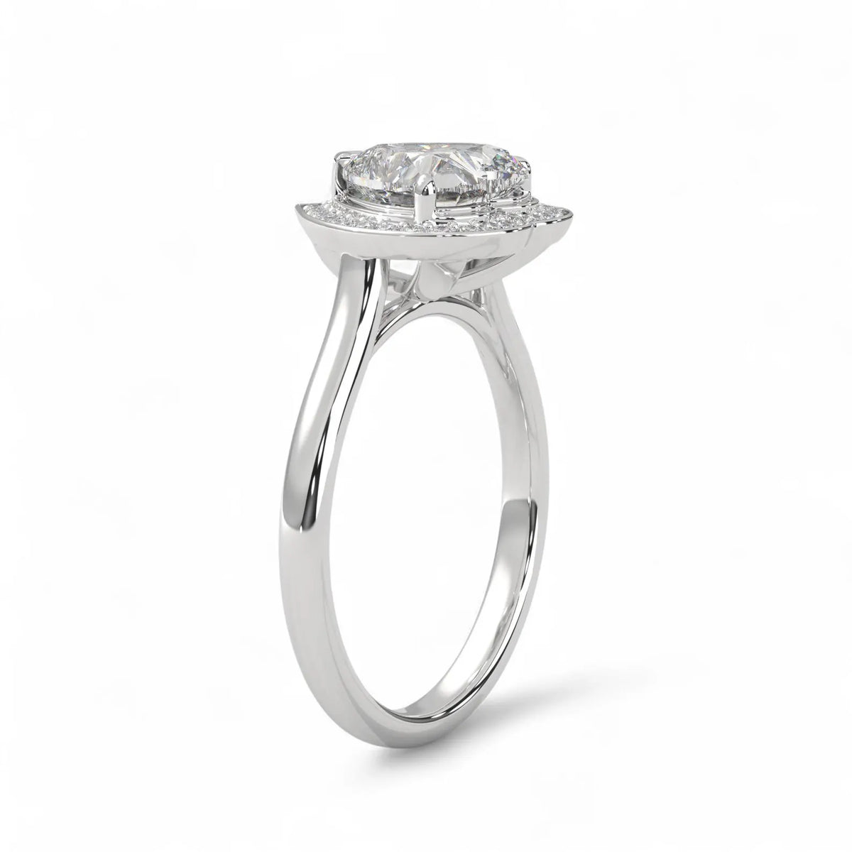 Three-quarter perspective of a 3 CT heart lab diamond halo ring on a polished white gold band.