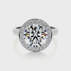 Direct top-down view of a 4 carat round lab diamond halo engagement ring with a white gold band.