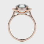 Side profile view showing cathedral setting and pavé under-gallery of a rose gold 4 CT round lab diamond ring.
