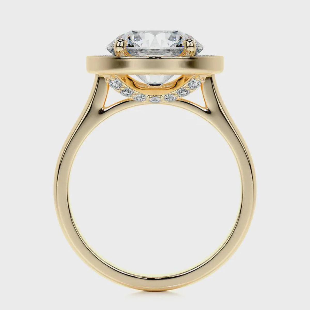 Side profile view of a yellow gold 4 CT round cut lab diamond halo ring featuring hidden under-gallery pavé.