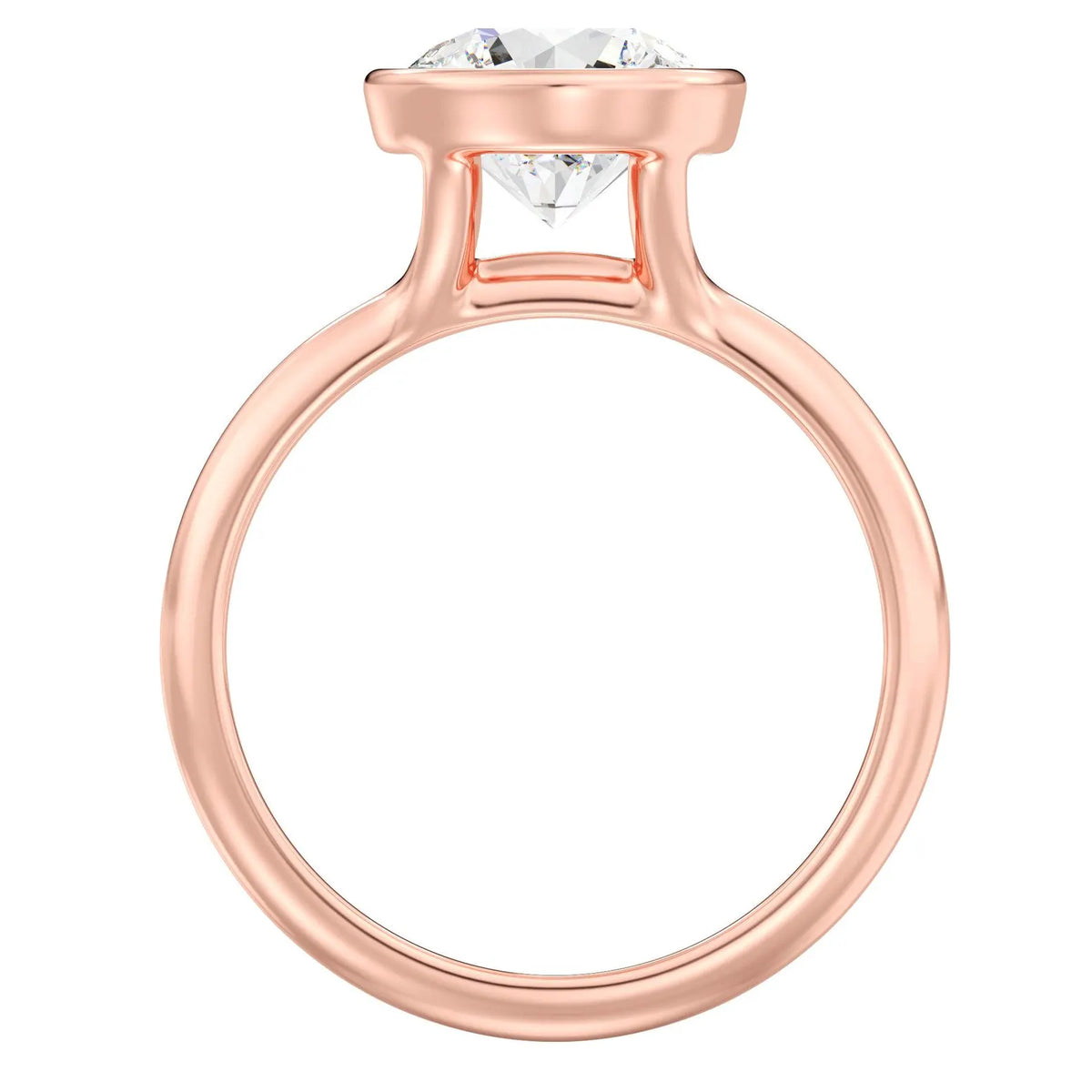 Full profile view of a rose gold 3 CT round lab grown diamond bezel solitaire ring.