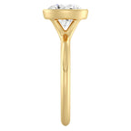 Side profile view showing the architectural bezel setting of a yellow gold 3 CT round lab diamond ring.