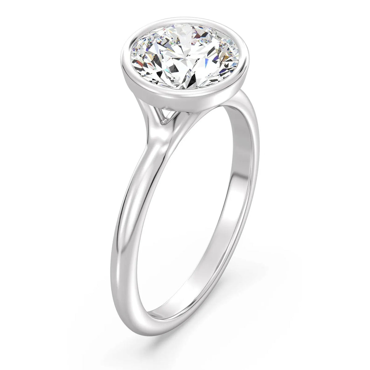 Angled perspective view of a 3 carat round cut lab diamond bezel ring in white gold.