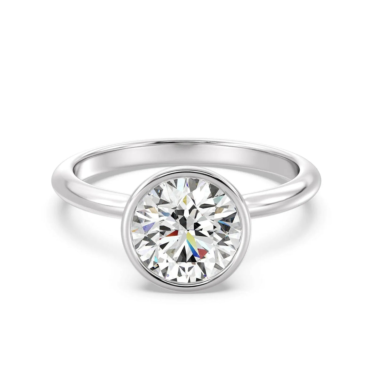 Front view of a 3 CT round cut lab grown diamond bezel solitaire ring in white gold.