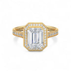 Top view of a 4 carat emerald cut lab grown diamond ring with halo setting in yellow gold.