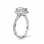 Side angle view of a white gold 4 carat emerald cut lab diamond halo engagement ring.