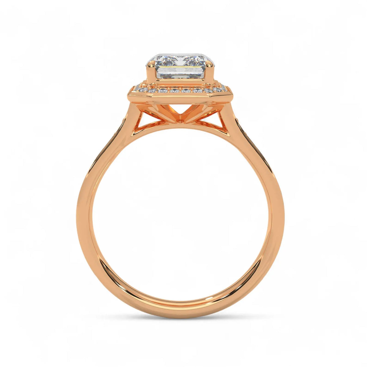 Side profile elevation view of a rose gold 4 CT emerald cut lab grown diamond halo ring.