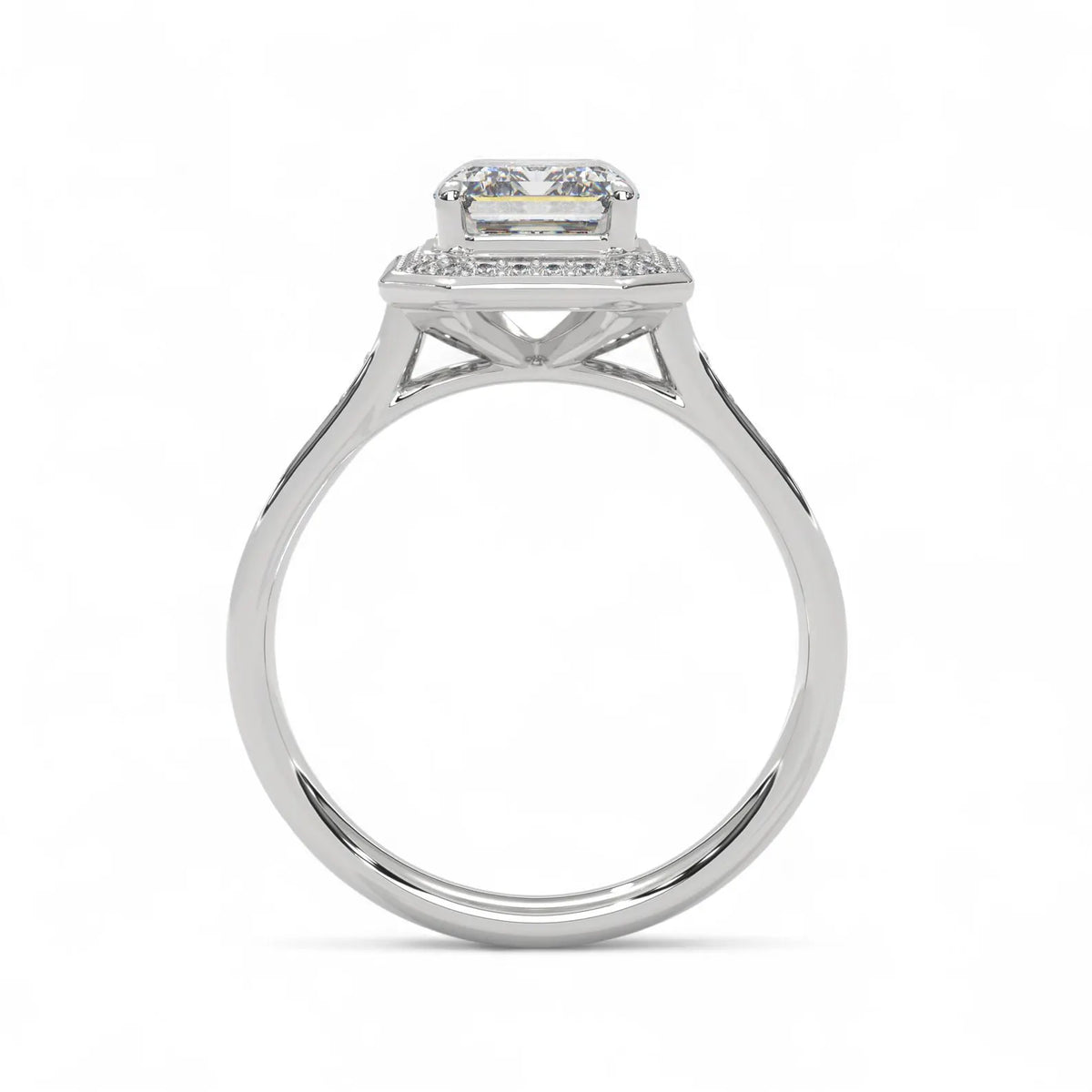 Side profile elevation view of a white gold 4 CT emerald cut lab diamond halo ring.