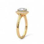 Angled view of a yellow gold 3 CT round cut lab diamond halo engagement ring.