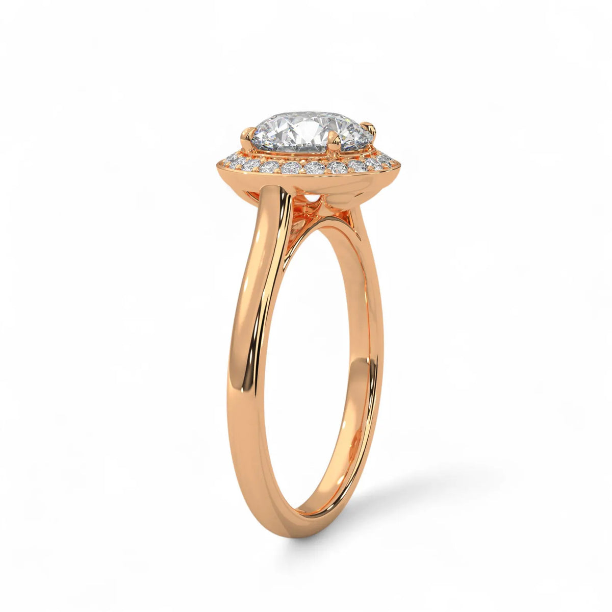 Angled view of a rose gold 3 carat round lab grown diamond halo engagement ring.