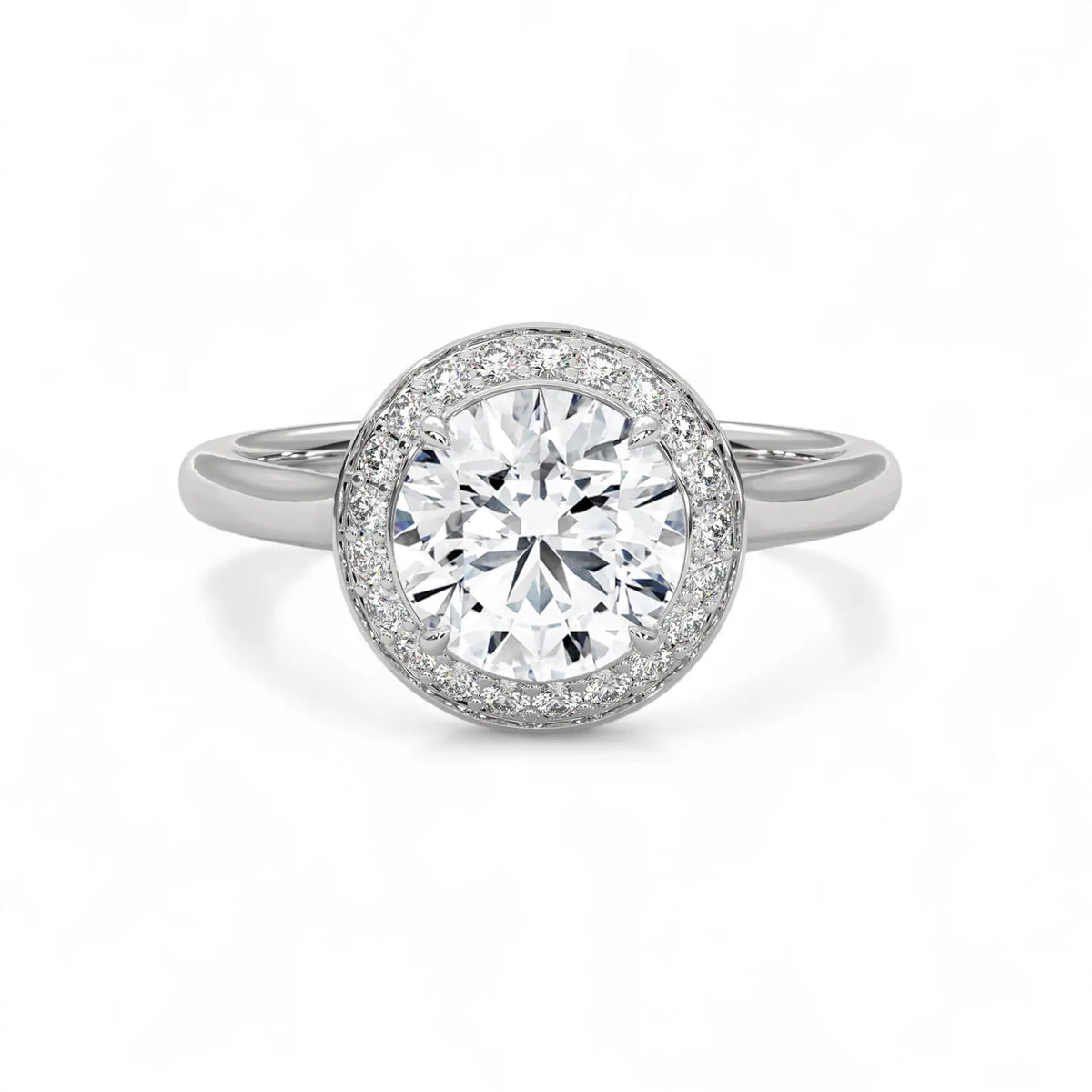 Top view of a white gold 3 carat round cut lab grown diamond halo engagement ring.