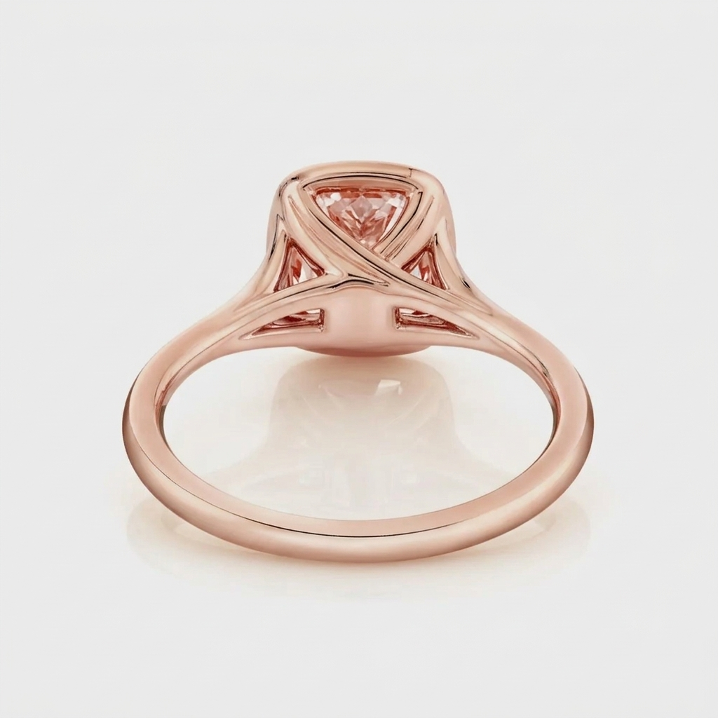 Detailed underside view of the rose gold architectural basket setting on a 2 CT pink cushion cut lab grown diamond ring.