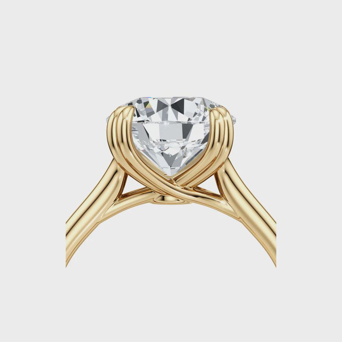 Close-up side profile of the woven cathedral basket setting holding a 2 carat round lab diamond in yellow gold.