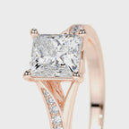 Close-up detail of a 2 carat princess cut lab diamond set in 14K rose gold with micro-pave accents.