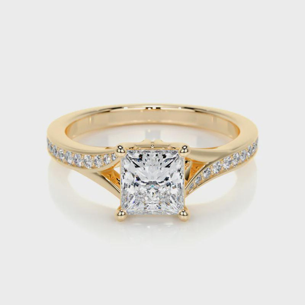 Front view of a 2 CT princess cut lab grown diamond engagement ring in polished yellow gold.