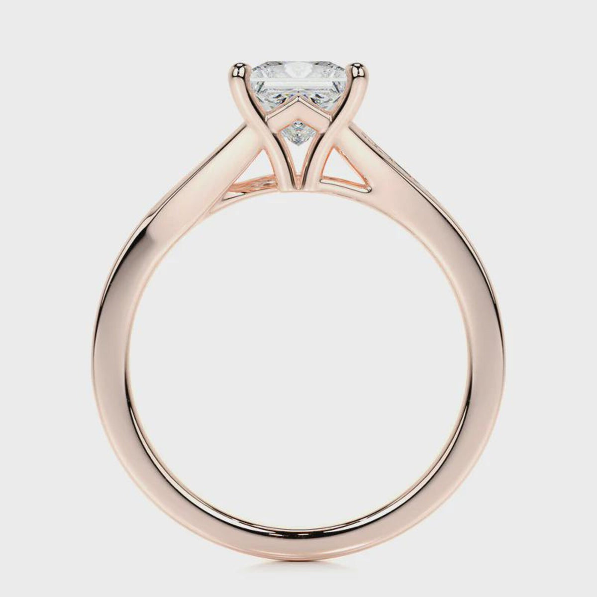 Side profile view of a 2 carat princess cut lab diamond solitaire ring in rose gold.