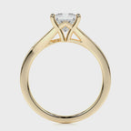 Side profile view of a 2 CT princess cut lab grown diamond engagement ring in yellow gold.