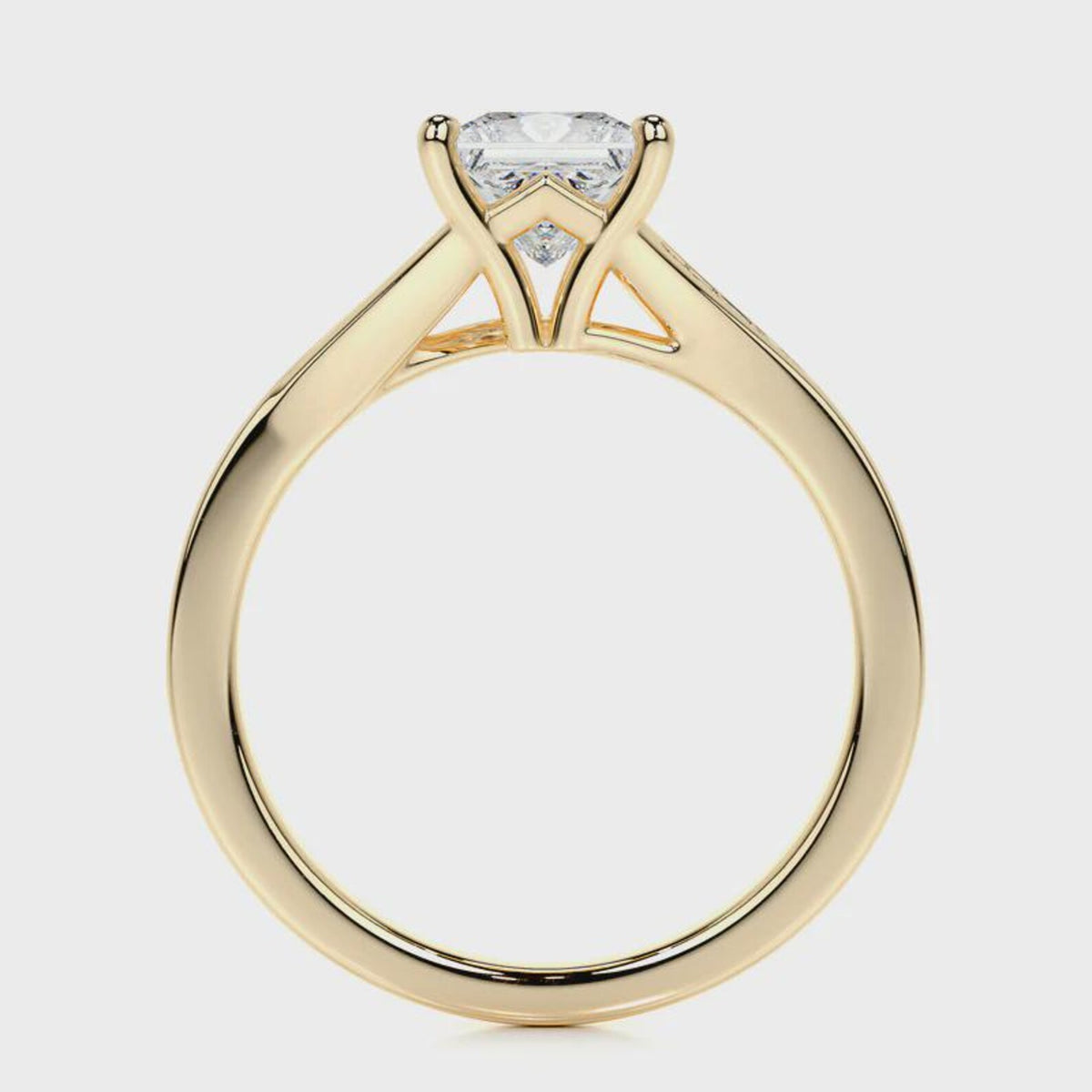 Side profile view of a 2 CT princess cut lab grown diamond engagement ring in yellow gold.