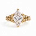 Front view of a 4 CT marquise cut lab grown diamond engagement ring in yellow gold with leaf engraving.